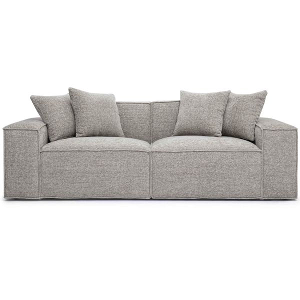 Sofa tapicerowana o prostej sylwetce z wywazonymi proporcjami w odcieniu szarosci